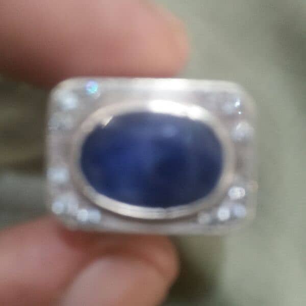 neelam stone and 12 gram silver ring. 4