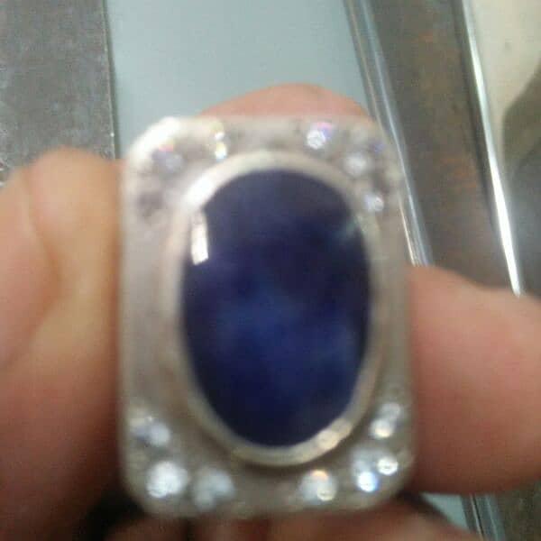 neelam stone and 12 gram silver ring. 5