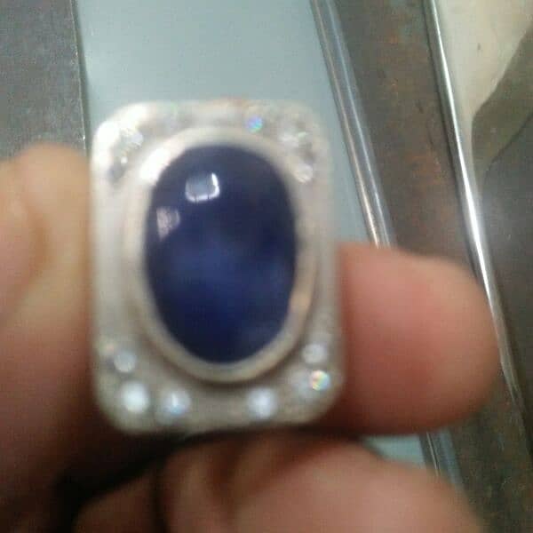 neelam stone and 12 gram silver ring. 6