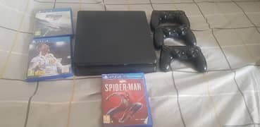 PS4 1 TB with 3 controllers and 3 ps4 games.