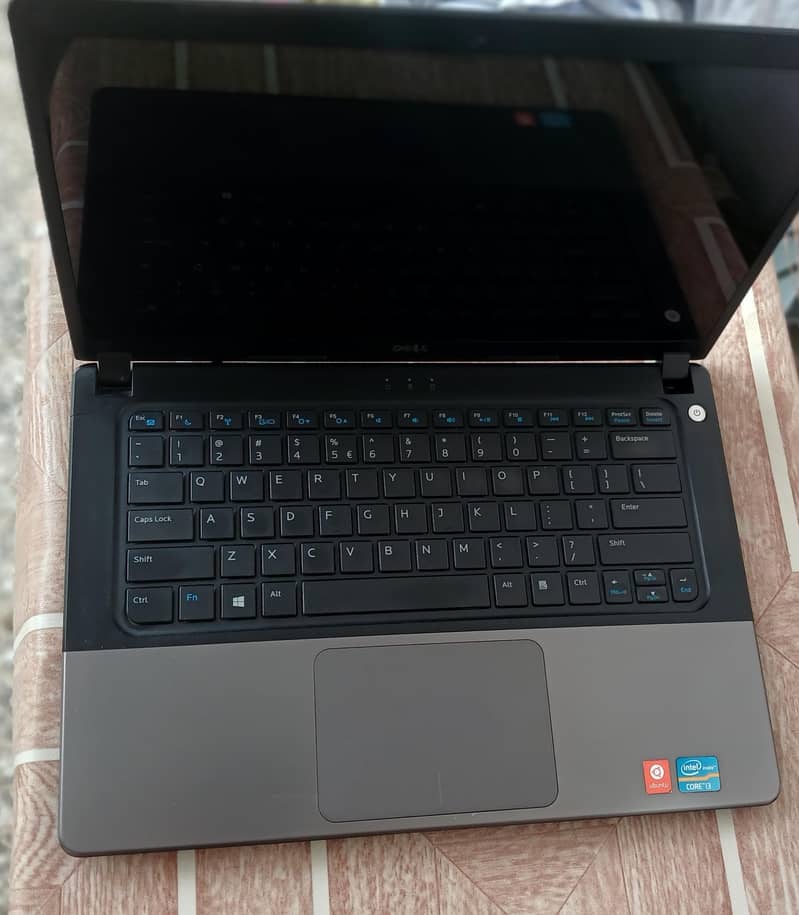 Dell 1560 Slim 0