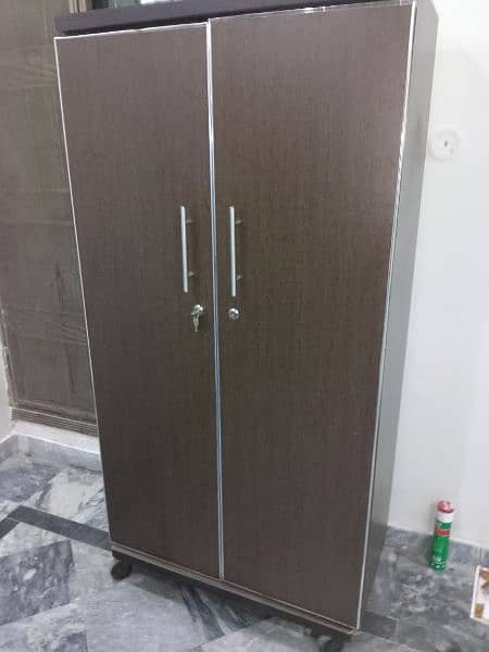 single bed with al Khair foam,  iron stand , wardrobe 4