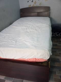 wooden brown color single bed without matress