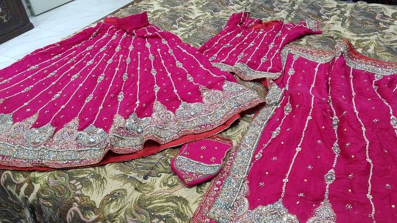 Pinkish red lehnga for bride 3