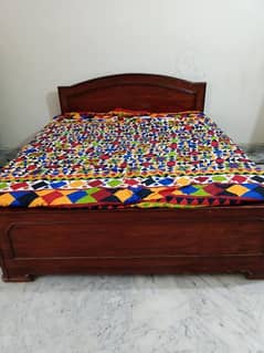 wooden bed along with medicated molty foam mattress