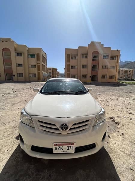 Toyota Corolla XLI 2013 model white colour 1