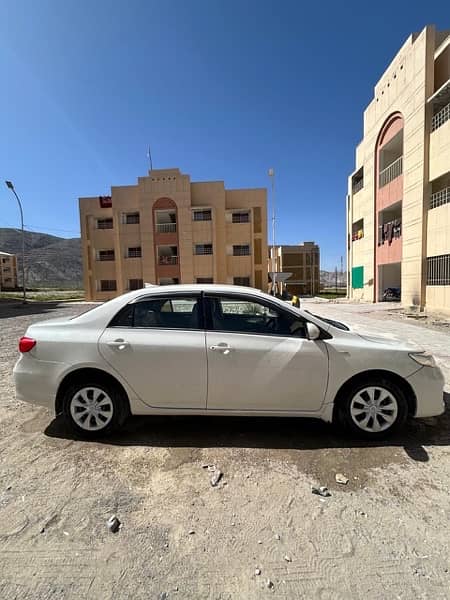 Toyota Corolla XLI 2013 model white colour 2