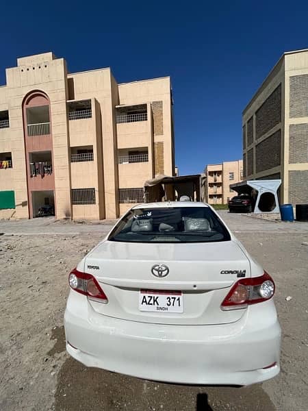 Toyota Corolla XLI 2013 model white colour 5