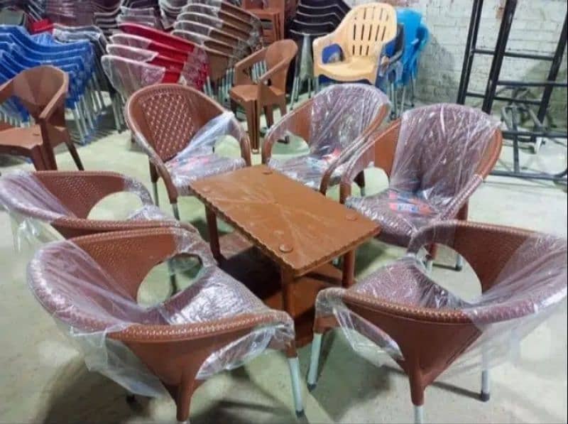 Set of 4 plastic chairs with 1 table available at wholesale price 0