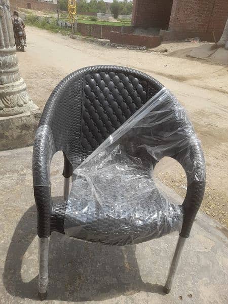 Set of 4 plastic chairs with 1 table available at wholesale price 5