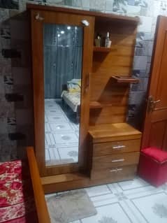 wooden bed with side table and dressing just in 67000,and 80000 0