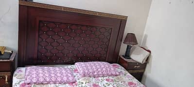 Ki g size bed 2 side tables and double dressing. . .
