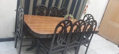 heavy wooden dinning with 8chairs in excellent condition all ok