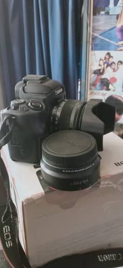 Canon m50 simple with box 3 battryes all assosry 0