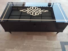 Luxurious black and golden center table