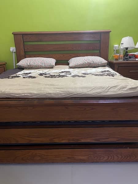 heavy wood bed with dressing and sidr tables 1