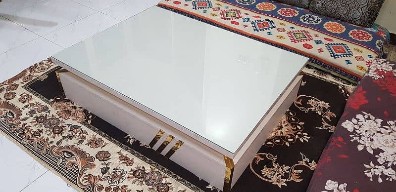 "Modern White Centre Table with Glass Top and Golden Accents for Sale" 1
