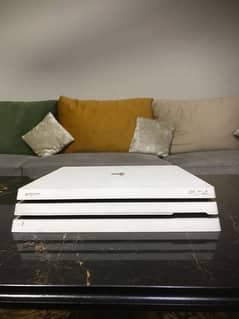 PS4 PRO 10/10 CONDITION WITH TWO CONTROLLERS AND 10+ Games