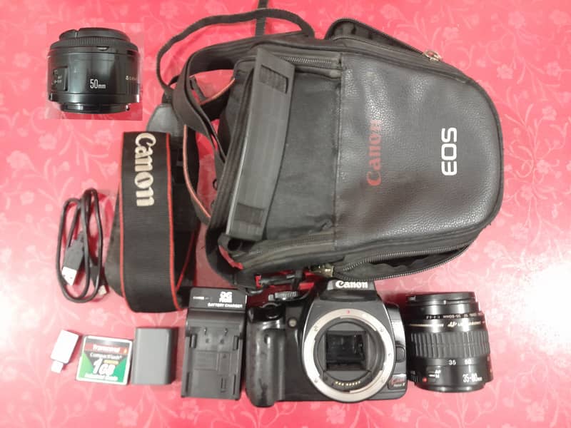 Canon 400d  | DSLR | Camera | 35 to 80 mm zoom lens | 50 mm prime lens 0