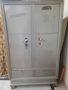 Cupboard with locker for wardrobe and accessories
