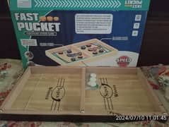 pucket board game wooden table