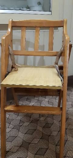 wooden baby chair in good condition for sale