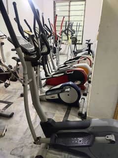 exercise cycle airbike elliptical tredmil recumbent spin bike machine