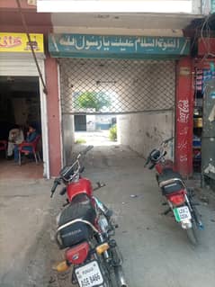 shop for rent on smsani road johar town in auto car market best for cars auto, battery detailing oil change setup etc