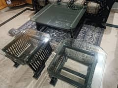 set of three glass tables