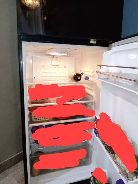 Waves Refrigerator Mediume Size 2 Year used 4