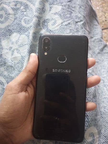 Samsung a10s model 2/32 memory finger bhi okay han 9