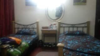 Two Single Beds with Dressing