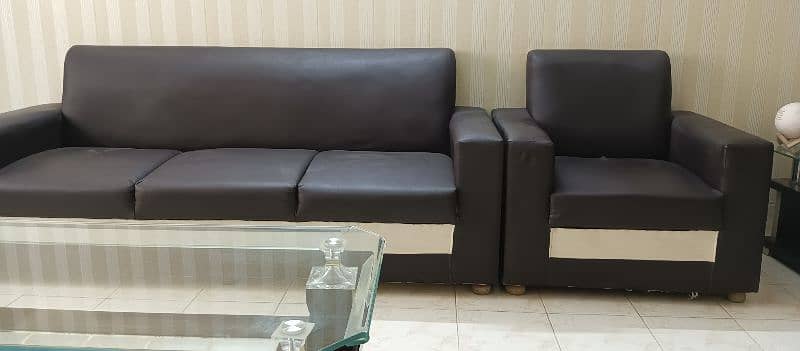 Used 8 seater sofa and center table 1