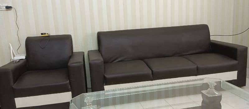 Used 8 seater sofa and center table 2