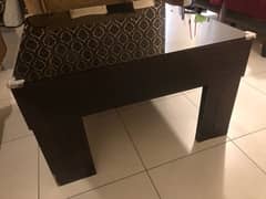 Center table with tinted brown glass