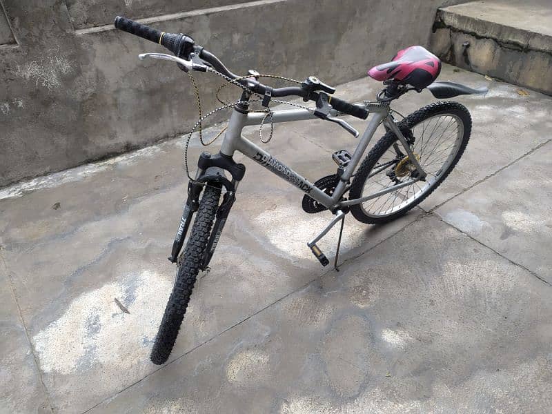 Mountain Bicycle with gears along air pump 1