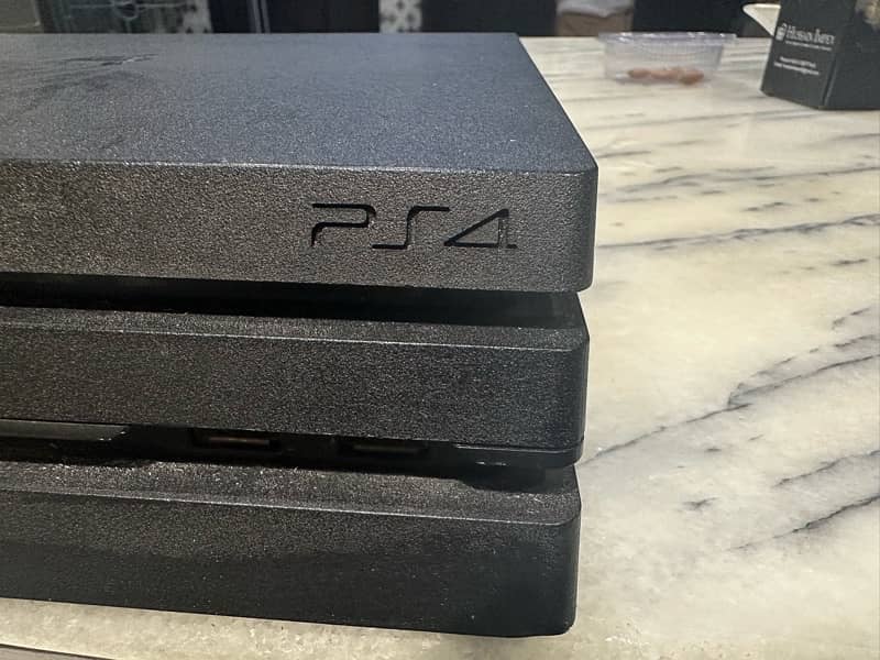 PS 4 pro 1 TB with two controllers 1