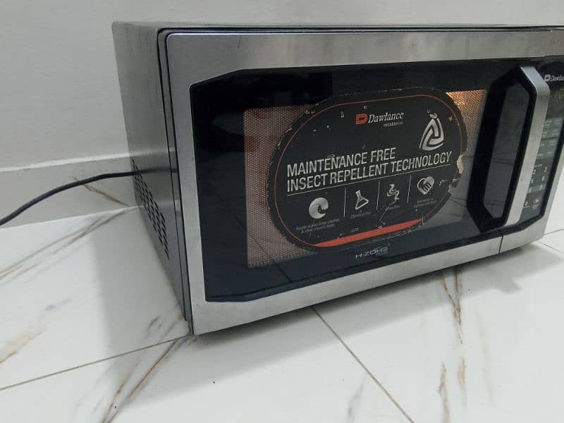 Dawlance microwave oven 2 in 1 grill baking bhi hote h large size 4