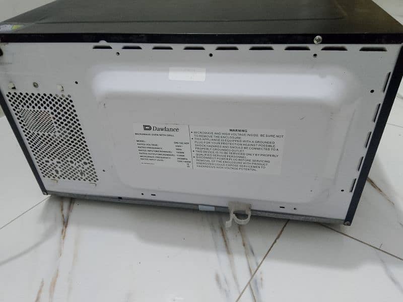 Dawlance microwave oven 2 in 1 grill baking bhi hote h large size 11