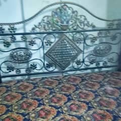 iron bed heavy with mattress