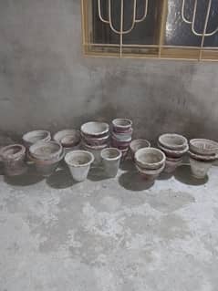 30 pots and 2 stands