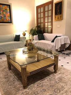 Glass top wooden center table with two side Tables
