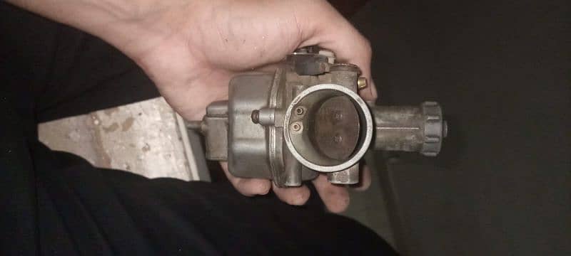 125 original carburetor 2