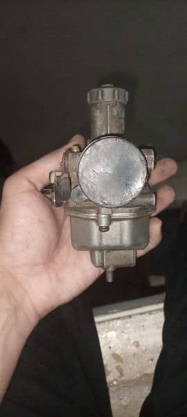 125 original carburetor 3