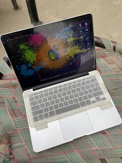 Macbook pro early 2015 core i5 2.7 with 8gb ram ,intel iris grapic