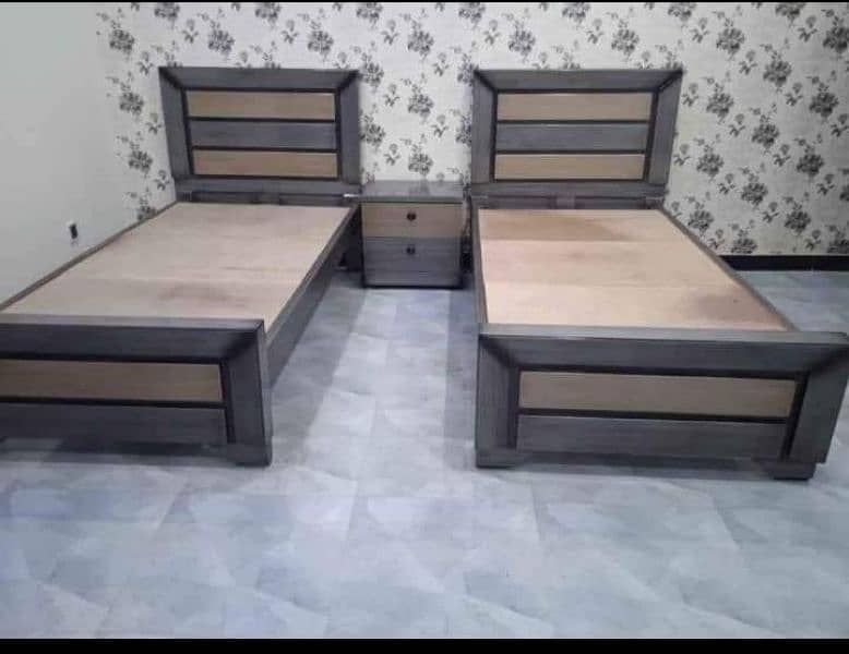 2 single beds and 1 Side table 0