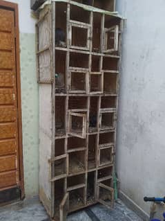 wooden cage with boxes