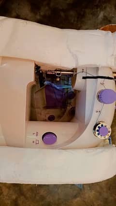 Mini sewing machine urgently for sale
