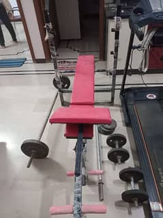 Treadmill and exercise table with different weights
