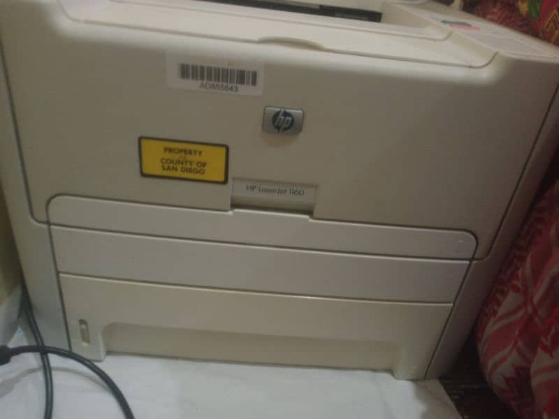 Hp lasser jet printer and original cabels only 1 month used 2